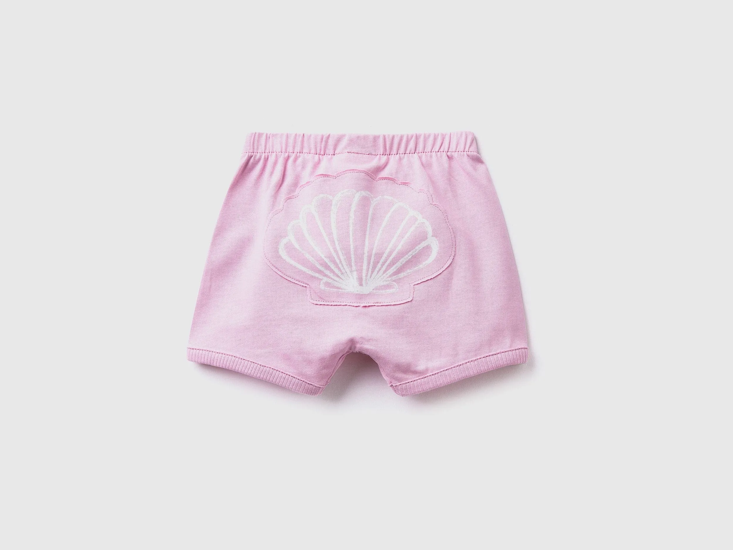 Shorts with patch on the back